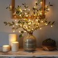 Olive branch with decorative lights
